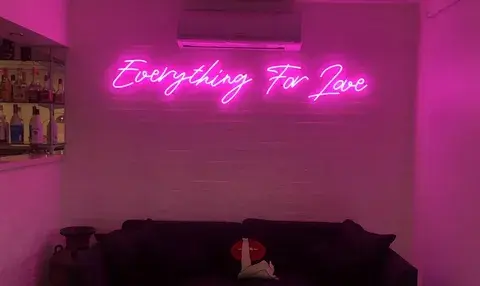 Home neon sign in bedroom